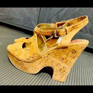 Make an offer!! Price Negotiable! 
Elaine Turner Cork Wedges Size 9